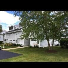 exterior space with a front lawn