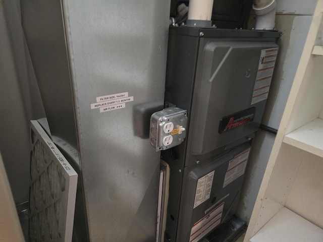 1470 S Delavan Club Dr Unit 6, Delavan, WI 53115 - utility room featuring heating unit