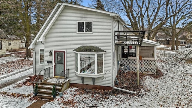 view of snow covered property