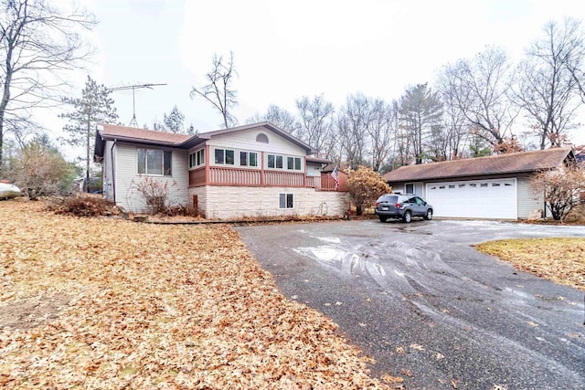 ranch-style house featuring a garage