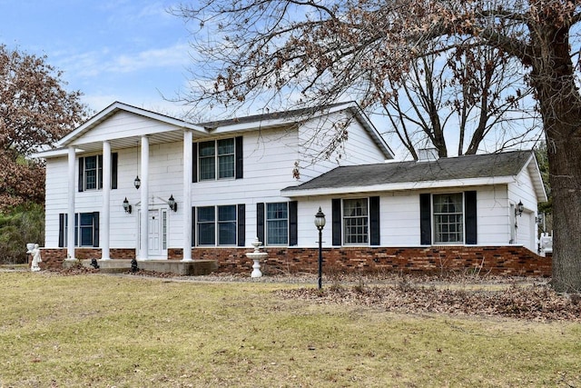 view of front facade featuring a front lawn