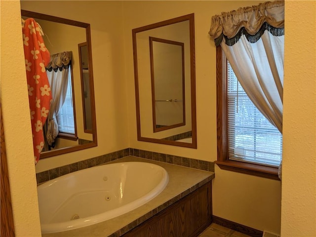 bathroom featuring a tub