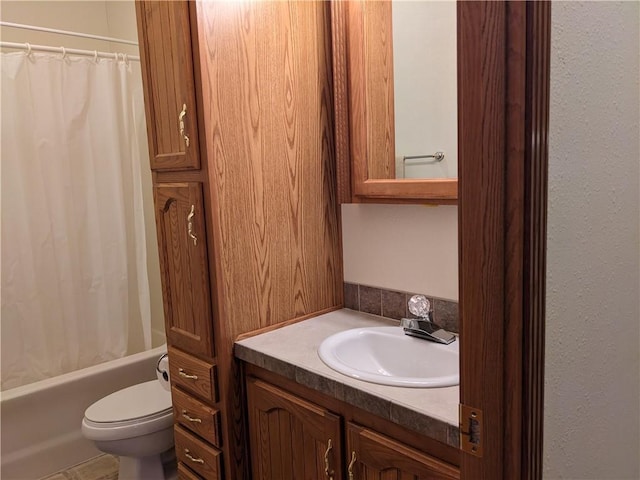 full bathroom featuring vanity, toilet, and shower / bath combo with shower curtain