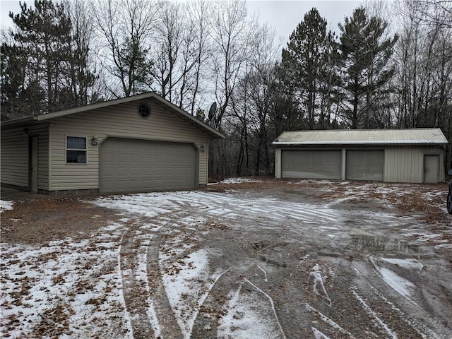 view of snow covered garage