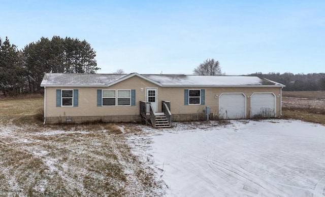 view of front of home featuring a garage