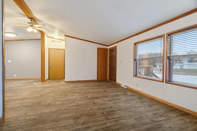 spare room featuring hardwood / wood-style floors, lofted ceiling, ceiling fan, and ornamental molding