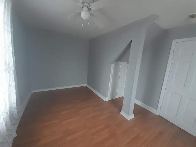 bonus room featuring ceiling fan, light hardwood / wood-style floors, and a wealth of natural light