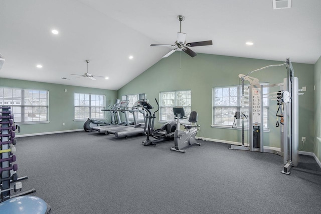 exercise room featuring ceiling fan and vaulted ceiling