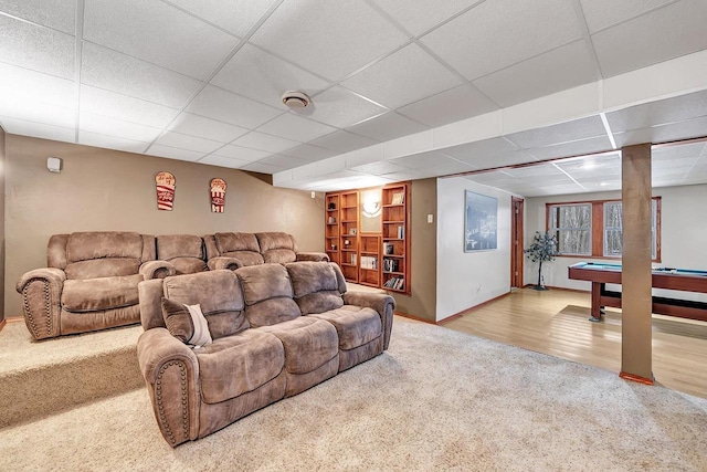 home theater featuring hardwood / wood-style flooring, a drop ceiling, and billiards