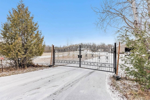 view of snow covered gate