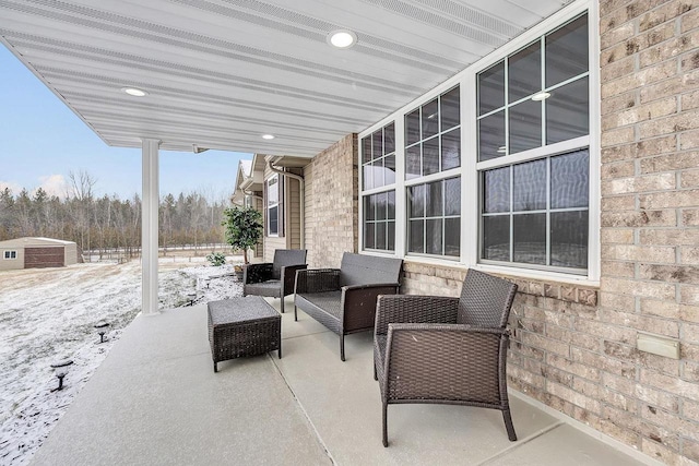 view of snow covered patio