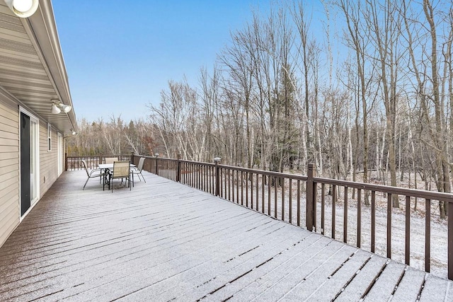 view of snow covered deck