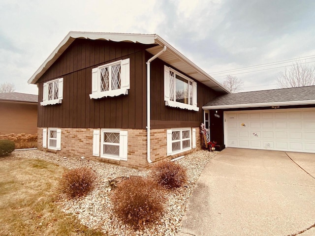 view of side of home with a garage