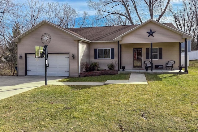 W3769 Alder Dr, Lake Geneva, WI 53147 - ranch-style home with covered porch, driveway, a garage, and a front lawn