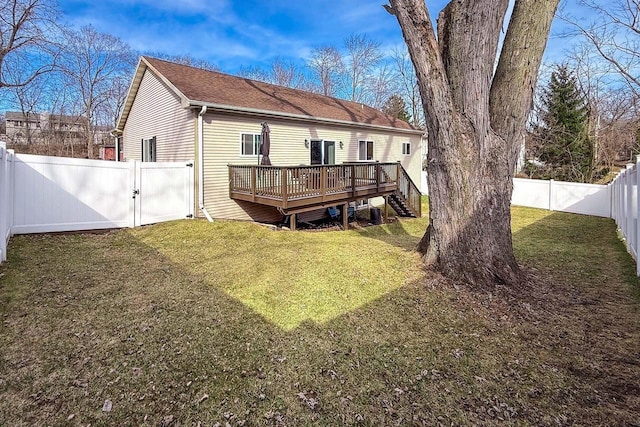 W3769 Alder Dr, Lake Geneva, WI 53147 - back of house with a wooden deck, a fenced backyard, and a gate