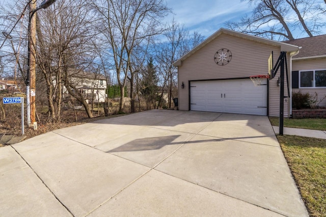 W3769 Alder Dr, Lake Geneva, WI 53147 - view of property exterior featuring driveway and a garage
