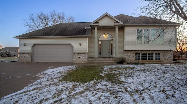 view of front of property with a garage