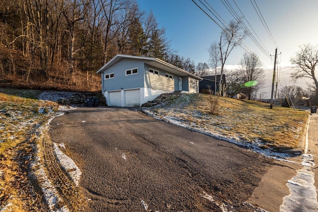 exterior space with a garage