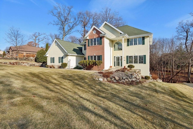 front facade featuring a front lawn