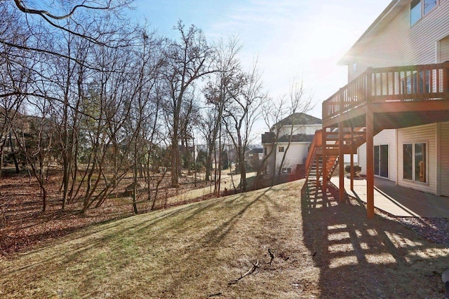 view of yard with a deck