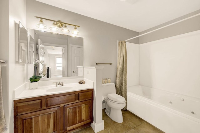 full bathroom featuring shower / bath combo with shower curtain, tile patterned flooring, vanity, and toilet