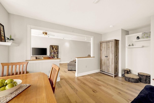 dining space featuring light hardwood / wood-style flooring