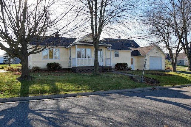 ranch-style house with a front lawn and a garage