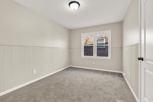 unfurnished room featuring carpet flooring