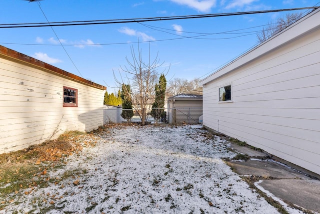 view of yard covered in snow