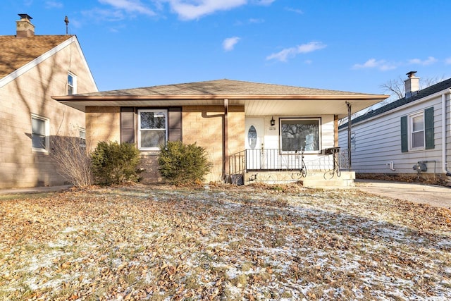 bungalow-style home with covered porch