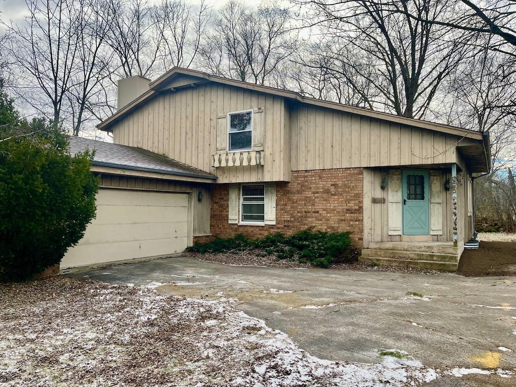 view of front of property with a garage