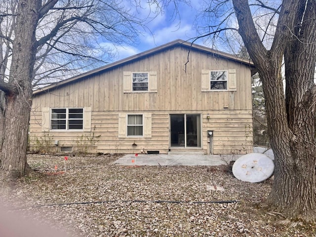 back of house with a patio area