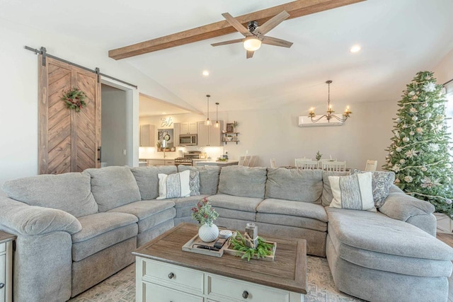 living room featuring a barn door, ceiling fan with notable chandelier, and vaulted ceiling with beams