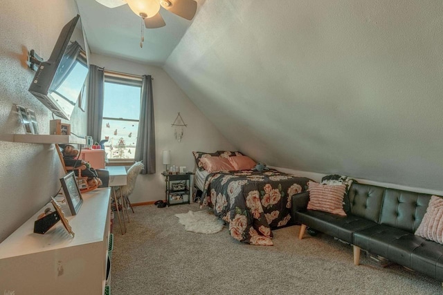 bedroom featuring ceiling fan, carpet floors, and lofted ceiling