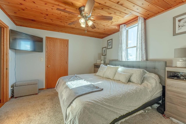 carpeted bedroom featuring ceiling fan and wooden ceiling