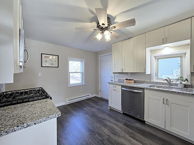 kitchen featuring white cabinetry, dark wood-type flooring, a baseboard heating unit, and appliances with stainless steel finishes