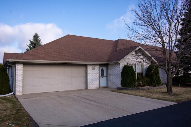 single story home with a garage