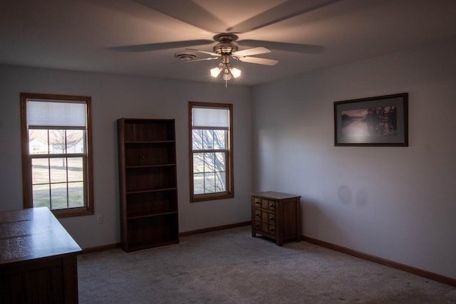 interior space featuring ceiling fan