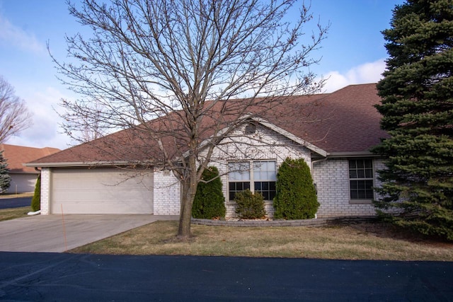 single story home with a garage