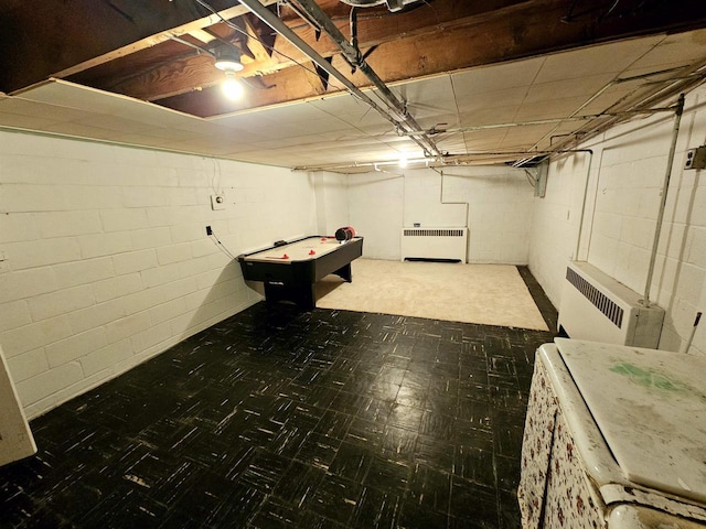 basement with radiator heating unit