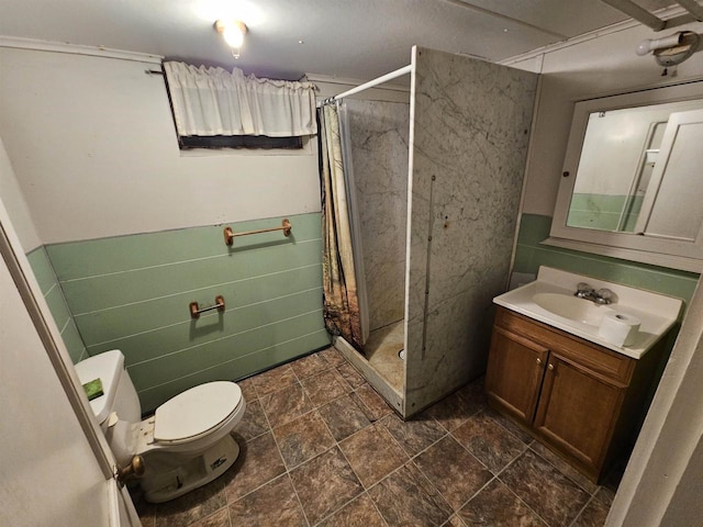 bathroom featuring toilet, vanity, tile walls, and a shower with shower curtain