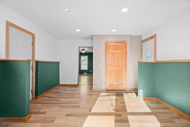 unfurnished room with light hardwood / wood-style flooring