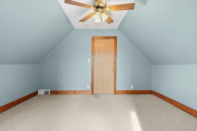 bonus room with ceiling fan, carpet floors, and lofted ceiling