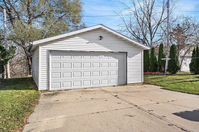 garage with a lawn