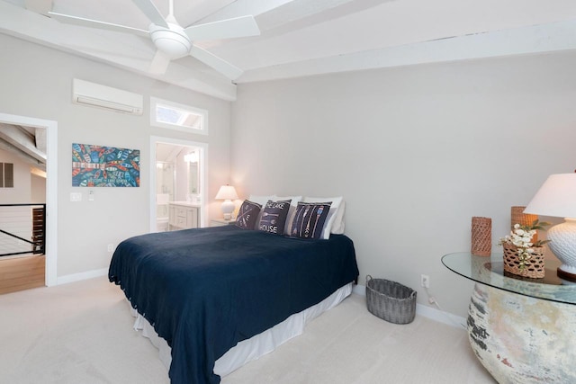 bedroom with a wall unit AC, ceiling fan, carpet flooring, and ensuite bathroom