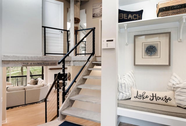 stairway featuring hardwood / wood-style floors