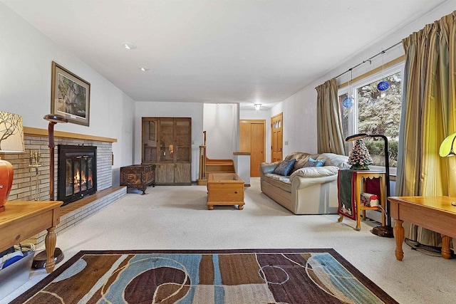 living room with light carpet and a fireplace