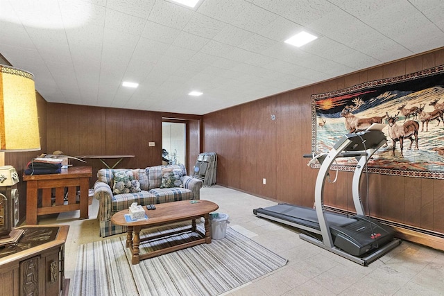 exercise room with wooden walls