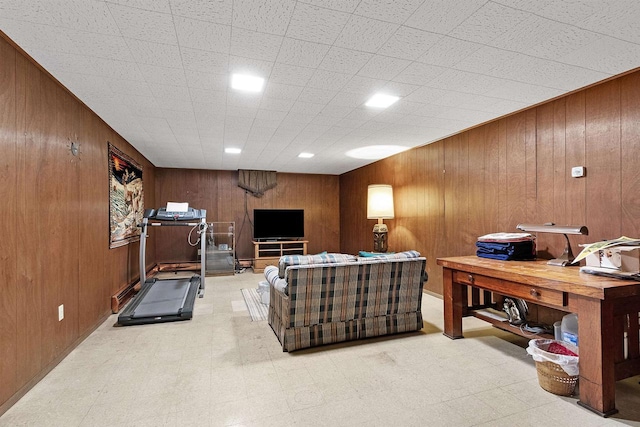 living room featuring wooden walls