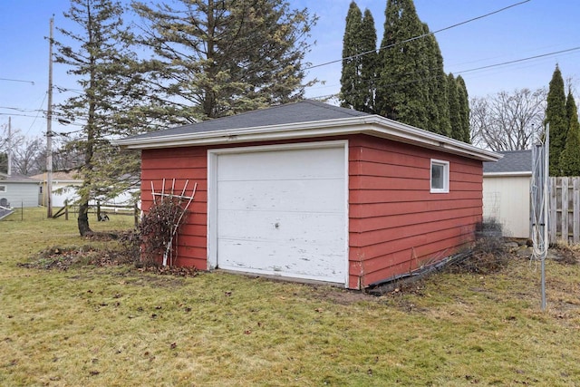 garage with a yard